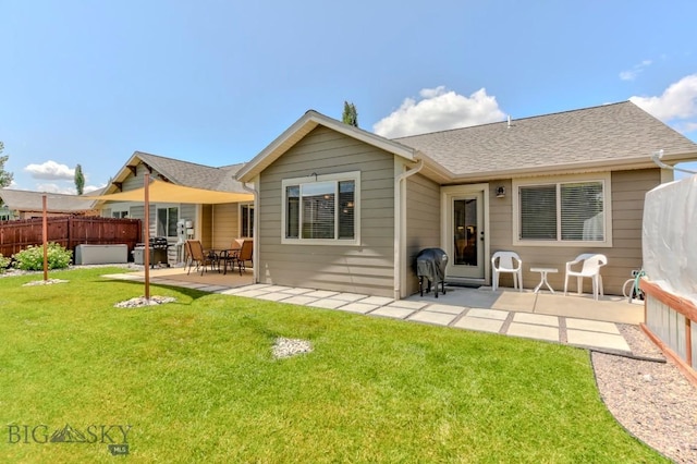 9848 Durston Rd Unit A, Bozeman, MT 59718 - rear view of property featuring a patio area and a shingled roof