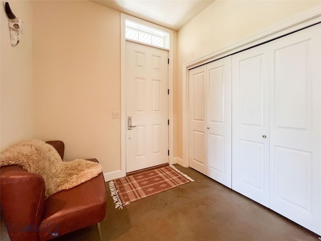 140 Village Crossing Way Unit 1J, Bozeman, MT 59715 - foyer with carpet floors and baseboards