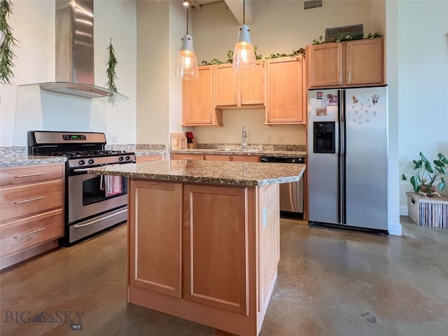 140 Village Crossing Way Unit 1J, Bozeman, MT 59715 - kitchen with stainless steel appliances, wall chimney range hood, finished concrete flooring, a kitchen island, and light stone countertops