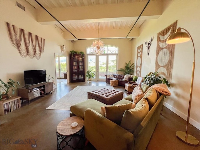 140 Village Crossing Way Unit 1J, Bozeman, MT 59715 - living area with a chandelier and a wood ceiling with exposed beams