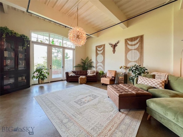140 Village Crossing Way Unit 1J, Bozeman, MT 59715 - living room featuring a chandelier and a wooden ceiling with exposed beams