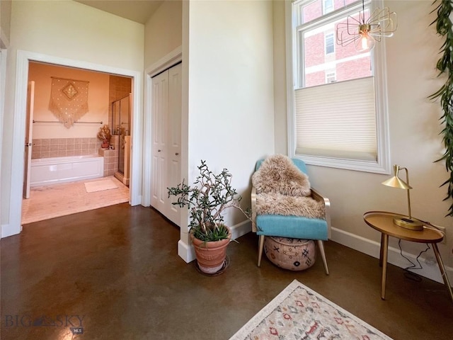 140 Village Crossing Way Unit 1J, Bozeman, MT 59715 - living area with concrete floors and baseboards