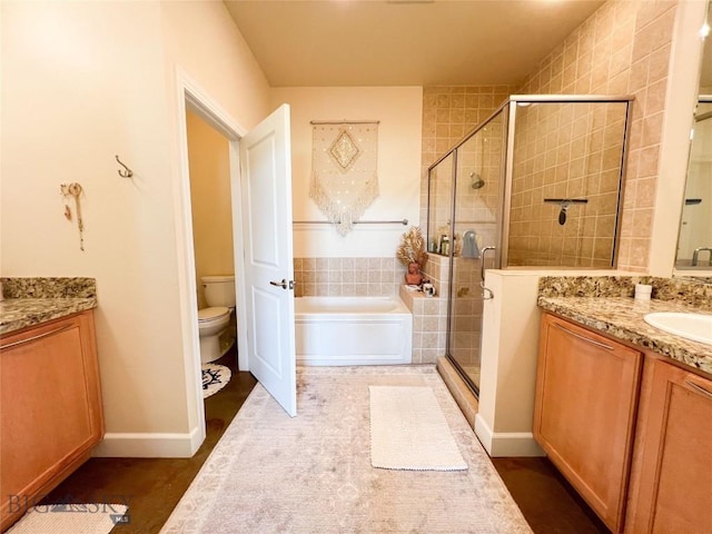 140 Village Crossing Way Unit 1J, Bozeman, MT 59715 - full bath featuring vanity, a shower stall, and a bath