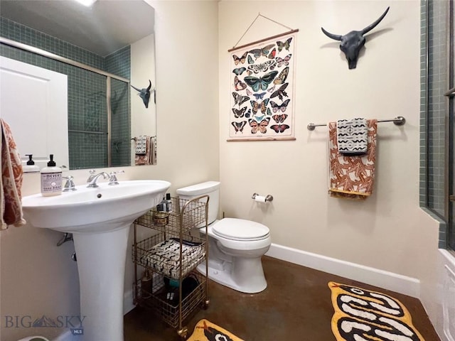 140 Village Crossing Way Unit 1J, Bozeman, MT 59715 - bathroom featuring a tile shower and finished concrete flooring