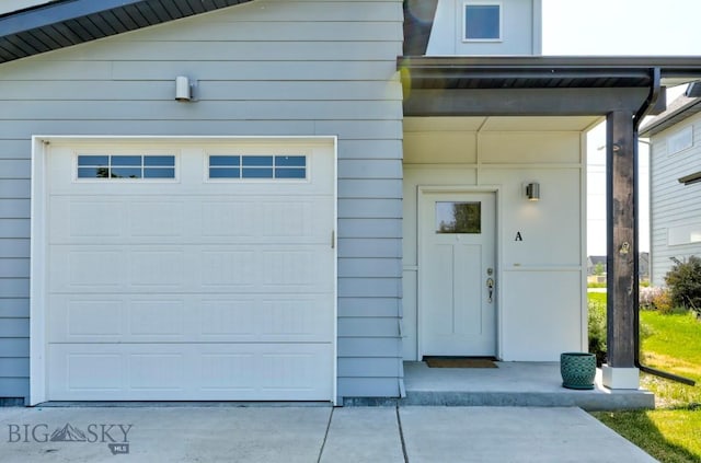 2002 Chipset St Unit A, Bozeman, MT 59718 - garage featuring concrete driveway