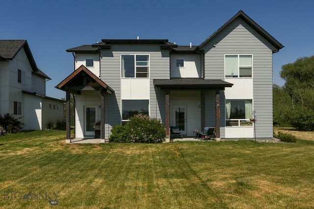 2002 Chipset St Unit A, Bozeman, MT 59718 - rear view of property featuring a yard