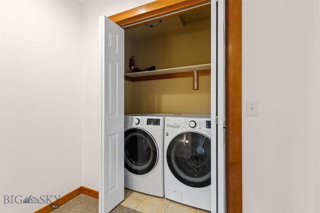 332 N Cottonwood Rd Unit F, Bozeman, MT 59718 - laundry room featuring washing machine and clothes dryer and light tile patterned floors