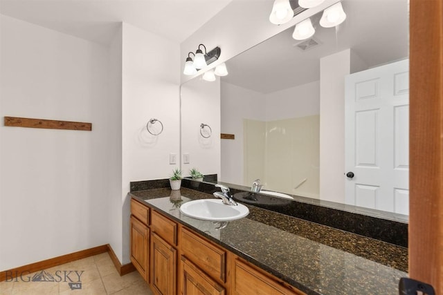 332 N Cottonwood Rd Unit F, Bozeman, MT 59718 - full bathroom featuring vanity and tile patterned floors