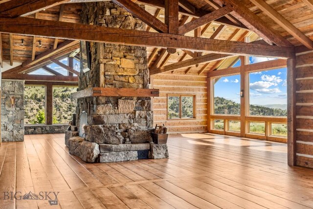 94 Sky Band Trl, Livingston, MT 59047 - unfurnished living room featuring hardwood / wood-style flooring and wood ceiling