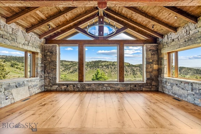 94 Sky Band Trl, Livingston, MT 59047 - unfurnished sunroom with wood ceiling, hardwood / wood-style floors, and healthy amount of natural light