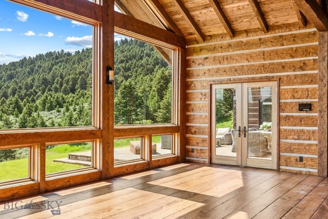 94 Sky Band Trl, Livingston, MT 59047 - unfurnished sunroom featuring french doors and a forest view