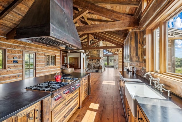 94 Sky Band Trl, Livingston, MT 59047 - kitchen with a wooden ceiling with exposed beams, stainless steel gas cooktop, high vaulted ceiling, healthy amount of natural light, and dark wood finished floors