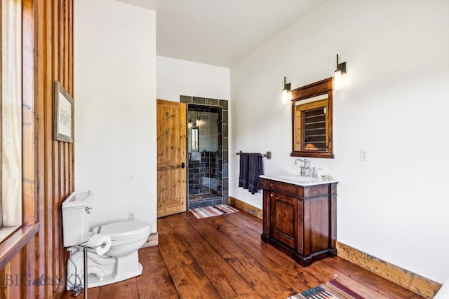 94 Sky Band Trl, Livingston, MT 59047 - bathroom with vanity, a shower stall, and wood-type flooring