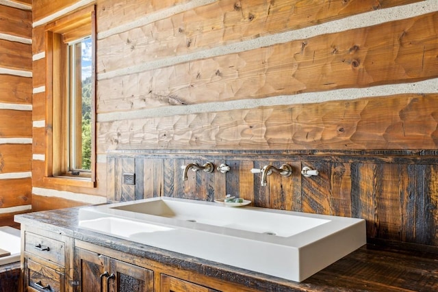 94 Sky Band Trl, Livingston, MT 59047 - bathroom with wood walls and vanity