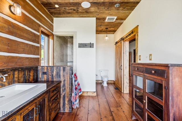 94 Sky Band Trl, Livingston, MT 59047 - bathroom featuring wood ceiling, vanity, and wood-type flooring