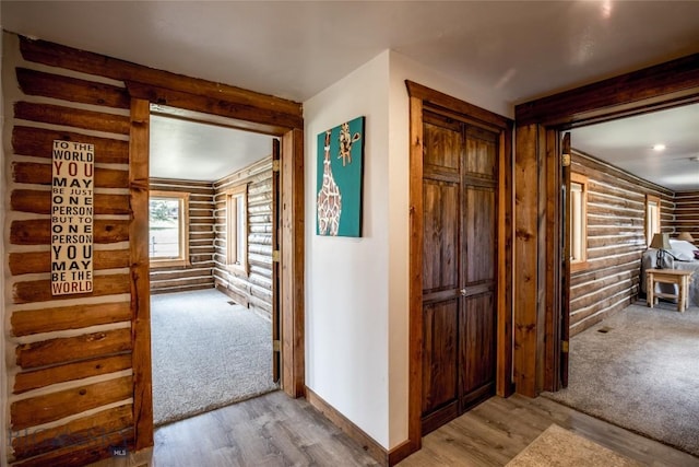 107 Antelope Meadows Rd, Ennis, MT 59729 - hall featuring log walls and light wood-type flooring