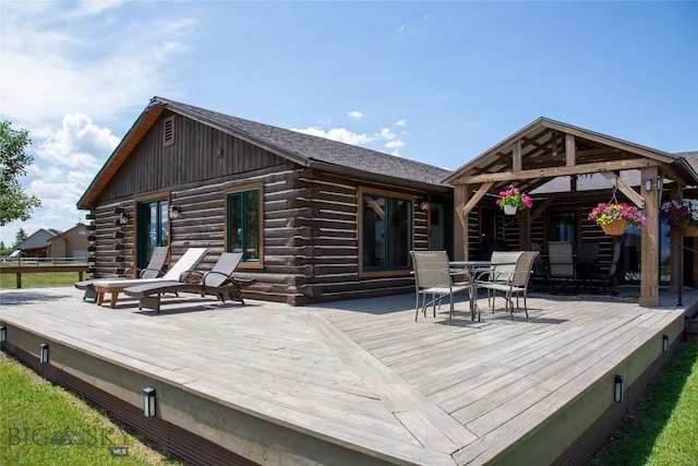107 Antelope Meadows Rd, Ennis, MT 59729 - wooden deck featuring outdoor dining space