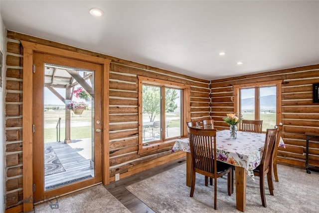 107 Antelope Meadows Rd, Ennis, MT 59729 - dining room with plenty of natural light, recessed lighting, rustic walls, and light wood-type flooring