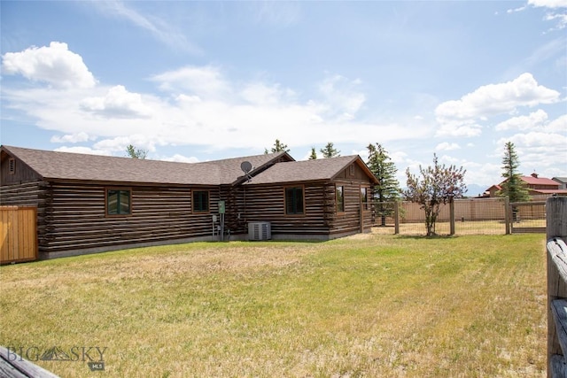 107 Antelope Meadows Rd, Ennis, MT 59729 - back of property with log siding and a shingled roof