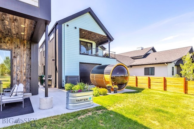1492 Windrow Dr, Bozeman, MT 59718 - rear view of house with a patio area