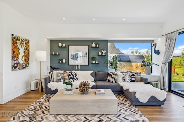 1492 Windrow Dr, Bozeman, MT 59718 - living area featuring wood finished floors and recessed lighting