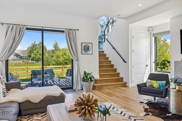 1492 Windrow Dr, Bozeman, MT 59718 - living area featuring stairway, wood finished floors, and recessed lighting