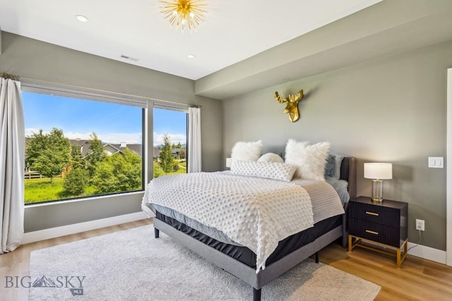 1492 Windrow Dr, Bozeman, MT 59718 - bedroom featuring light wood-style floors and recessed lighting