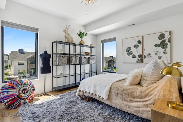 1492 Windrow Dr, Bozeman, MT 59718 - bedroom featuring wood finished floors