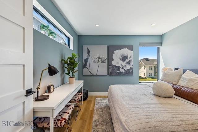 1492 Windrow Dr, Bozeman, MT 59718 - bedroom featuring wood finished floors and recessed lighting