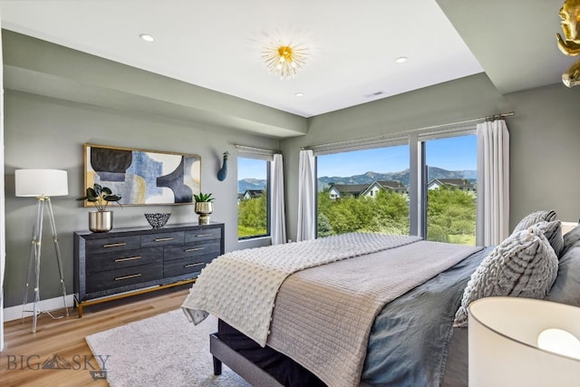 1492 Windrow Dr, Bozeman, MT 59718 - bedroom featuring light wood-style floors and recessed lighting