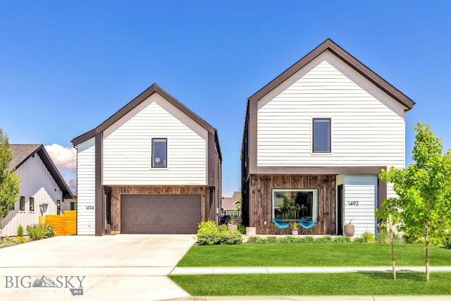 1492 Windrow Dr, Bozeman, MT 59718 - view of front facade with concrete driveway