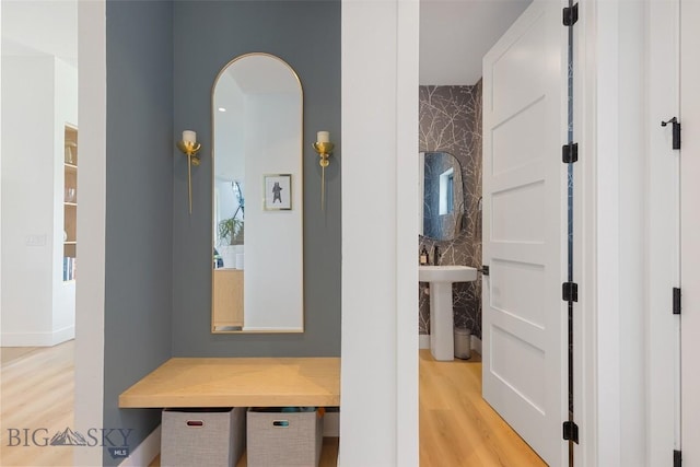 1492 Windrow Dr, Bozeman, MT 59718 - corridor with light wood-style flooring and arched walkways