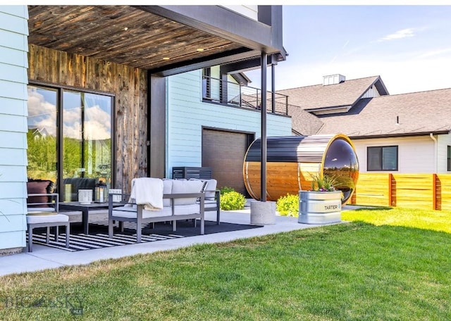 1492 Windrow Dr, Bozeman, MT 59718 - rear view of house with a lawn, outdoor lounge area, a garage, and a patio