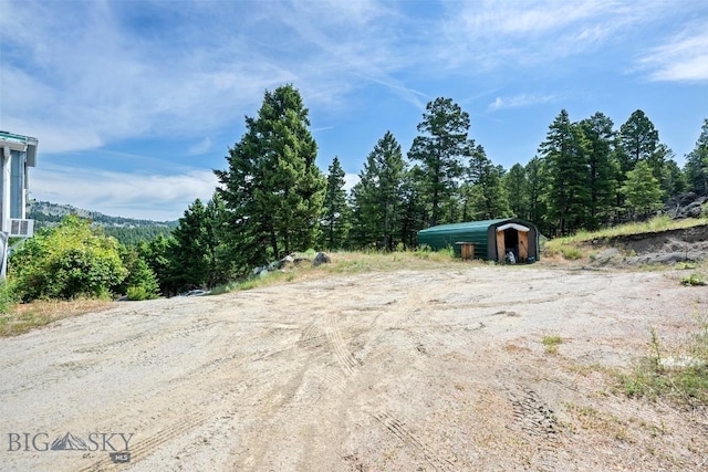 16 Friendspring Mt, Whitehall, MT 59759 - view of yard with a view of trees