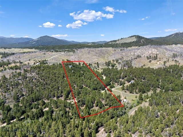 16 Friendspring Mt, Whitehall, MT 59759 - aerial view of property's location with a mountainous background and property boundaries highlighted