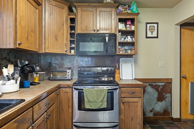 120 N Pine Butte, Bozeman, MT 59718 - kitchen featuring black microwave, stainless steel electric range, tile countertops, open shelves, and decorative backsplash