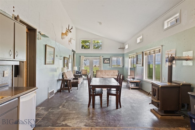 120 N Pine Butte, Bozeman, MT 59718 - dining area with french doors, a wood stove, and high vaulted ceiling
