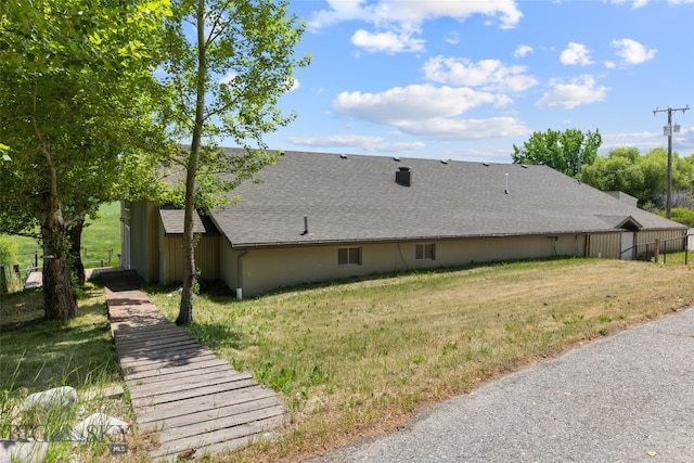 120 N Pine Butte, Bozeman, MT 59718 - back of house featuring roof with shingles