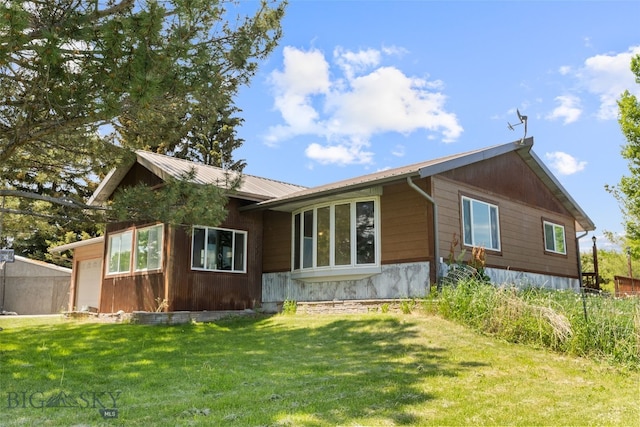 120 N Pine Butte, Bozeman, MT 59718 - back of property with a yard and a metal roof