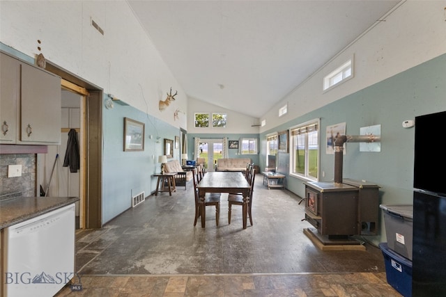 120 N Pine Butte, Bozeman, MT 59718 - dining room with a wood stove, high vaulted ceiling, and healthy amount of natural light
