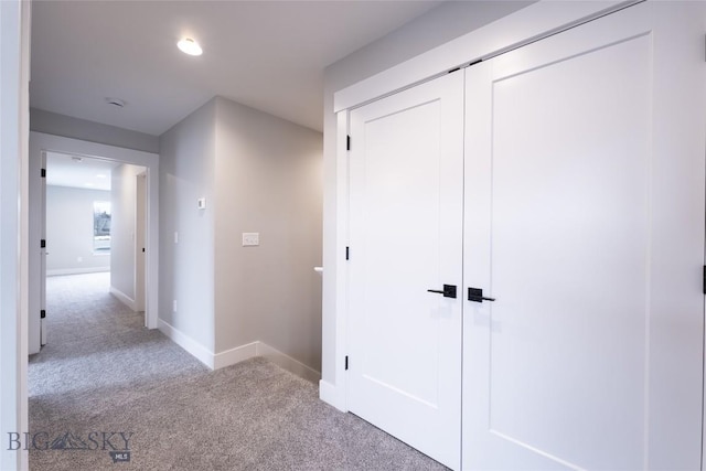 740 Rogers Way Unit A, Bozeman, MT 59718 - corridor featuring light colored carpet and baseboards
