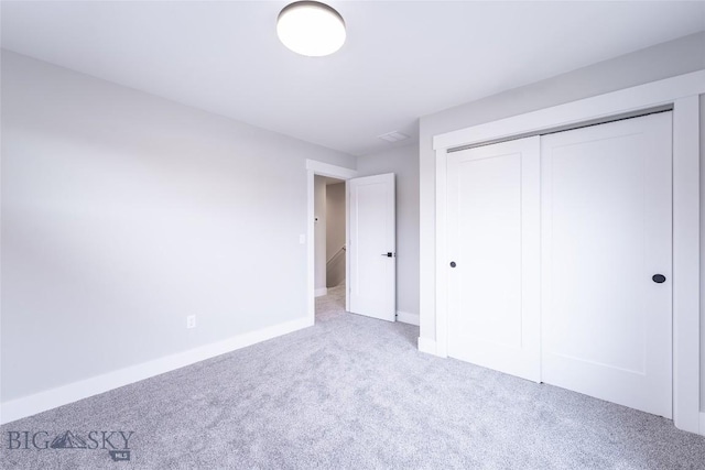 740 Rogers Way Unit A, Bozeman, MT 59718 - unfurnished bedroom with carpet floors and a closet