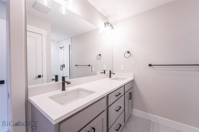 740 Rogers Way Unit A, Bozeman, MT 59718 - full bathroom with double vanity, tile patterned floors, and a shower stall