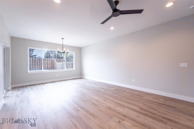 740 Rogers Way Unit A, Bozeman, MT 59718 - spare room with a chandelier, ceiling fan, light wood-style floors, and recessed lighting