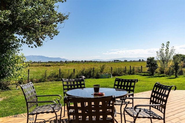 109 Cottonwood St, Manhattan, MT 59741 - view of patio with a view of countryside, outdoor dining area, and a deck with mountain view