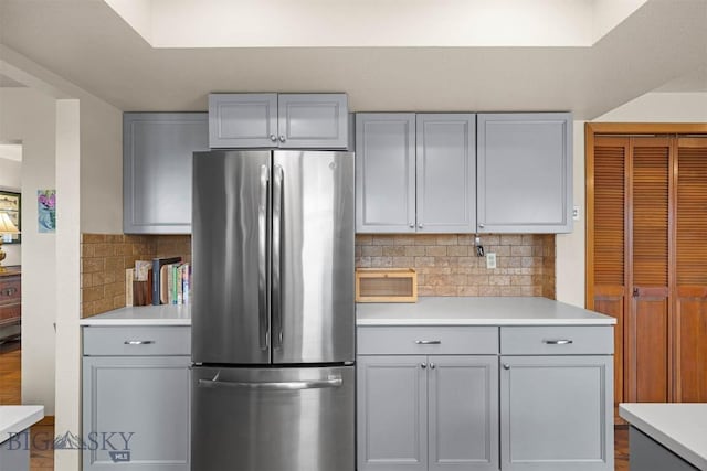 109 Cottonwood St, Manhattan, MT 59741 - kitchen featuring freestanding refrigerator, gray cabinetry, and light countertops
