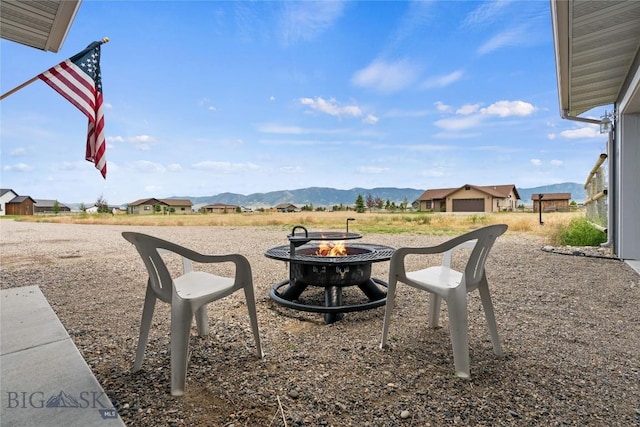 15 Sky Vw, Ennis, MT 59729 - view of yard with an outdoor fire pit and a mountain view