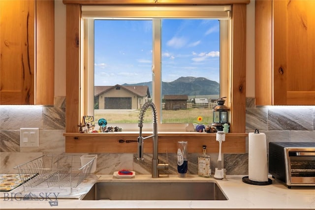 15 Sky Vw, Ennis, MT 59729 - kitchen view of decorative backsplash and brown cabinetry
