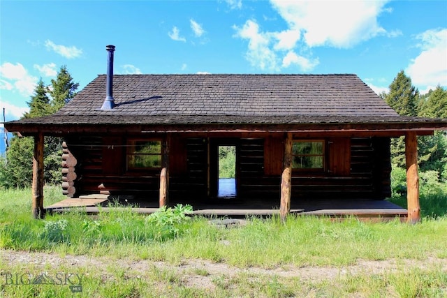 524 Grizzly Meadow Rd, Emigrant, MT 59027 - rear view of property with log siding