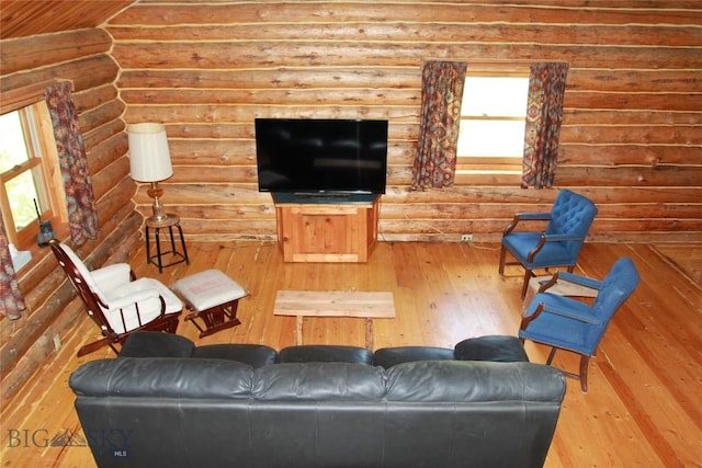 524 Grizzly Meadow Rd, Emigrant, MT 59027 - living area featuring log walls and hardwood / wood-style floors
